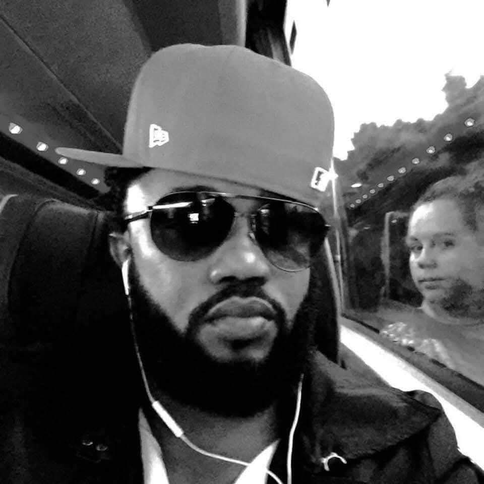 Black and white portrait of CJ